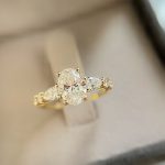 Lab-Created Diamond Ring, 1 Carat Oval Cut with Dazzling Pear-Shaped Sidestones in 14k Yellow Gold - Image 5