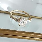 Lab-Created Diamond Ring, 1 Carat Oval Cut with Dazzling Pear-Shaped Sidestones in 14k Yellow Gold - Image 3